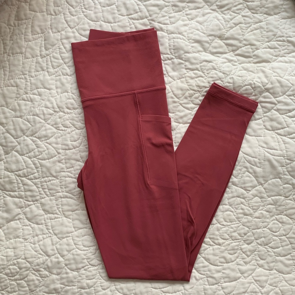 Athleta salutation stash pocket II